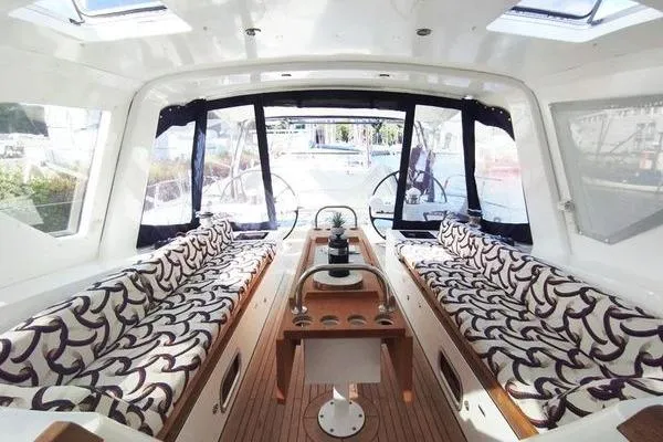 Mary Blue III Yacht Photos Pics Interior of 2008 Garcia GY 63 Aluminium Centreboard yacht with patterned seating.