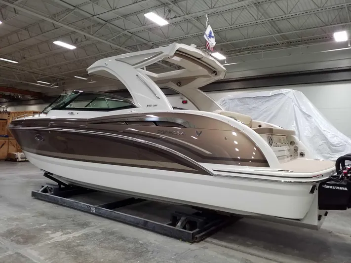  Yacht Photos Pics 2019 Formula 350 Crossover Bowrider OB in a showroom, side view.