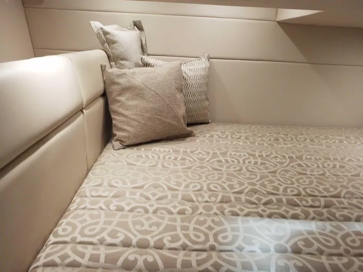  Yacht Photos Pics 2019 Formula 350 Crossover Bowrider OB cabin with patterned bedding and cushions.