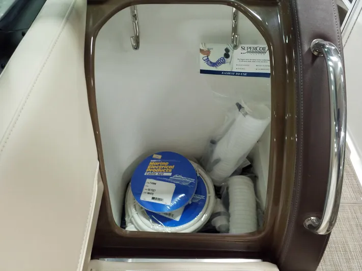  Yacht Photos Pics 2019 Formula 350 Crossover Bowrider OB storage with marine electrical products and accessories.