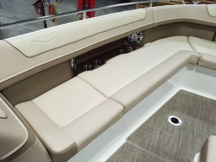  Yacht Photos Pics 2019 Formula 350 Crossover Bowrider OB interior with beige seating and cup holders.