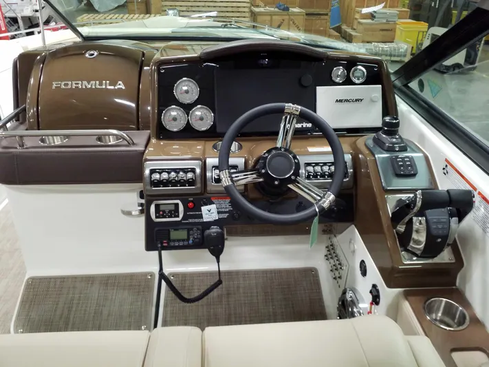  Yacht Photos Pics 2019 Formula 350 Crossover Bowrider OB dashboard with steering wheel and controls.