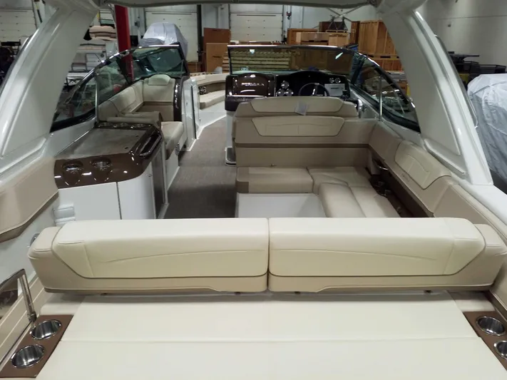  Yacht Photos Pics 2019 Formula 350 Crossover Bowrider OB interior with beige seating and modern design.