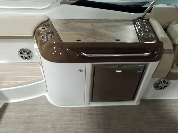  Yacht Photos Pics 2019 Formula 350 Crossover Bowrider OB interior with sleek kitchenette and cup holders.