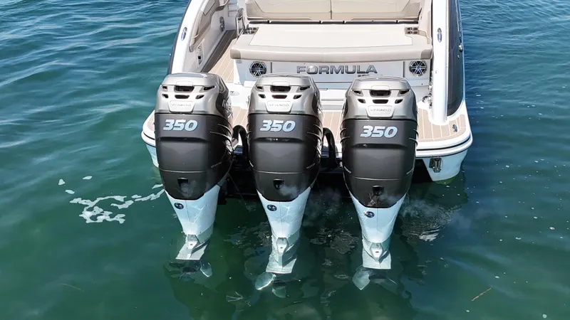  Yacht Photos Pics 2019 Formula 350 Crossover Bowrider OB with triple 350 horsepower outboard engines on water.