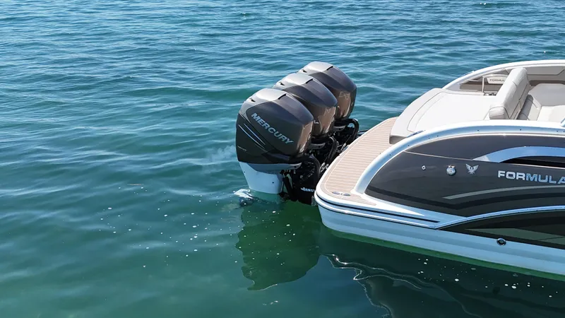  Yacht Photos Pics 2019 Formula 350 Crossover Bowrider OB with triple Mercury outboard engines on water.
