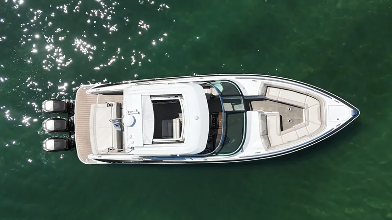  Yacht Photos Pics 2019 Formula 350 Crossover Bowrider OB, aerial view on water.