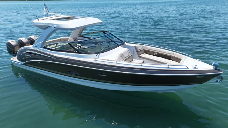  Yacht Photos Pics 2019 Formula 350 Crossover Bowrider OB on calm blue water.