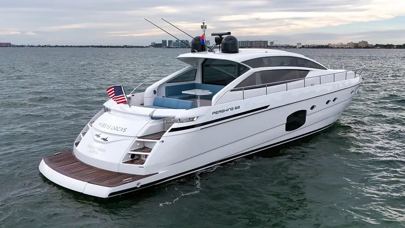  Yacht Photos Pics 2020 Pershing 62 yacht cruising on open water, featuring sleek design and modern amenities.