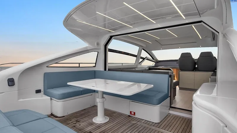  Yacht Photos Pics Luxury interior of 2020 Pershing 62 yacht with modern seating and sleek design.