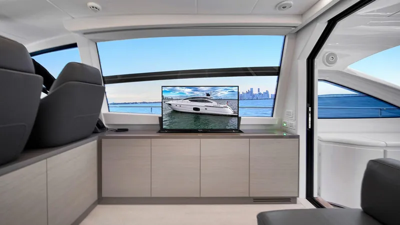  Yacht Photos Pics Luxurious interior of 2020 Pershing 62 yacht with scenic ocean view.