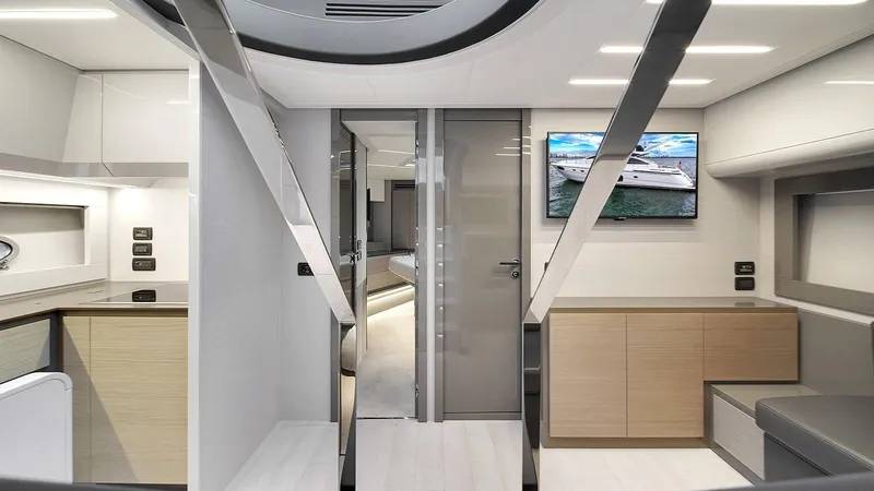  Yacht Photos Pics Luxurious interior of a 2020 Pershing 62 yacht, featuring modern design and sleek furnishings.