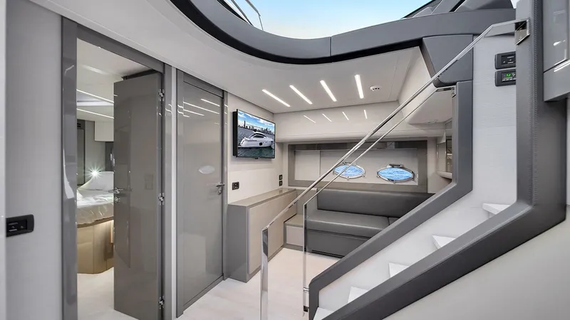  Yacht Photos Pics Luxurious interior of 2020 Pershing 62 yacht with modern design and elegant furnishings.