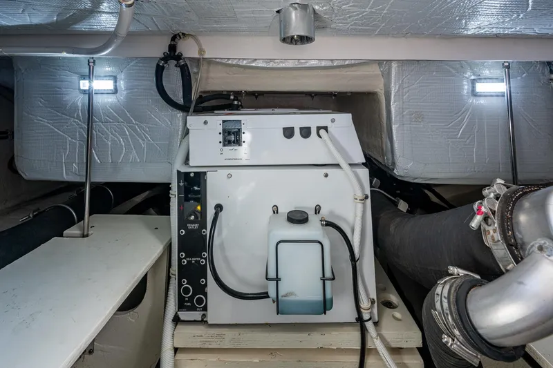 Yacht Photos Pics Engine room of 2020 Tiara Yachts C44 Coupe, showcasing mechanical components and insulation.