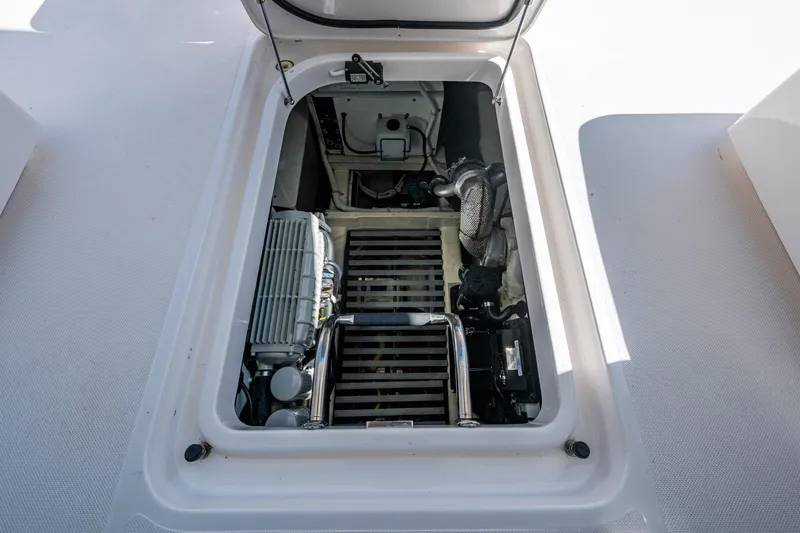  Yacht Photos Pics Engine compartment of 2020 Tiara Yachts C44 Coupe, showcasing mechanical components.