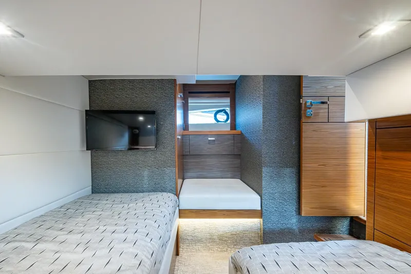  Yacht Photos Pics 2020 Tiara Yachts C44 Coupe interior cabin with modern design and twin beds.