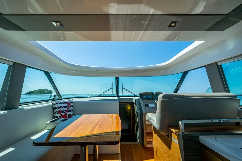 Yacht Photos Pics Interior of 2020 Tiara Yachts C44 Coupe with panoramic windows and modern design.