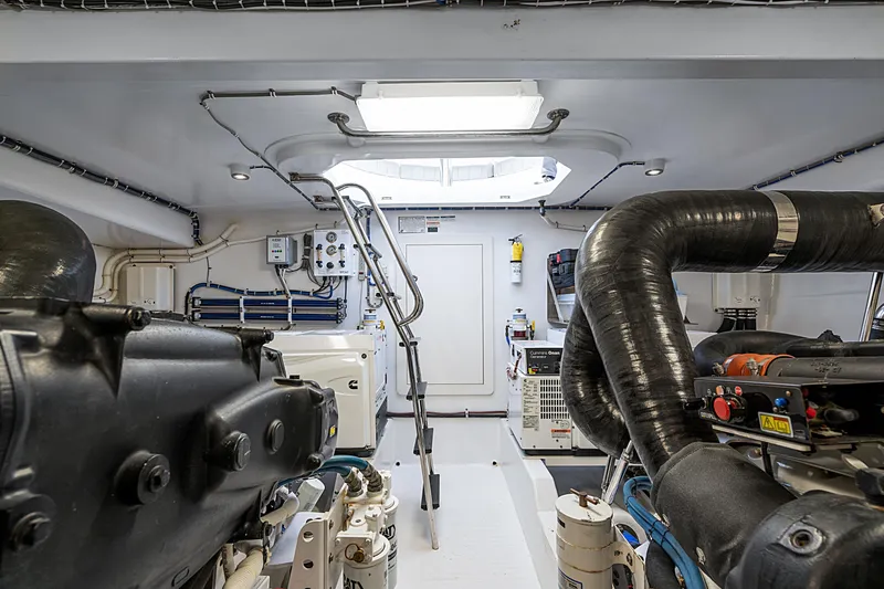 Elsewhere Yacht Photos Pics Engine room of 2013 Hatteras 60 Motor Yacht, featuring advanced mechanical systems.