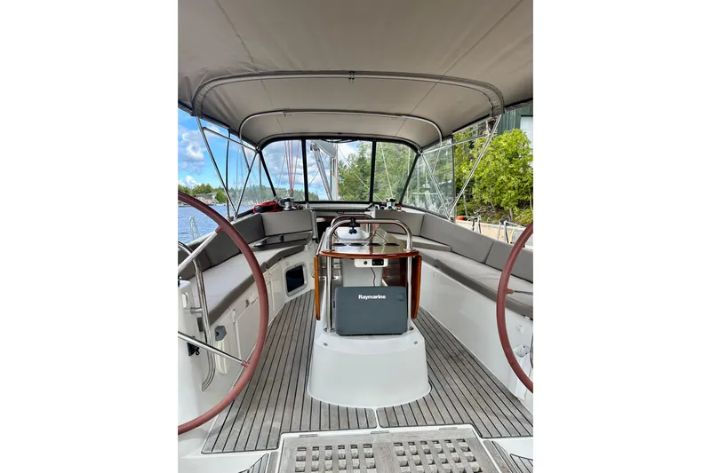 Porte Du Soleil Yacht Photos Pics 2015 Jeanneau Sun Odyssey 50 DS cockpit with dual steering wheels and Raymarine equipment.