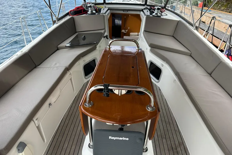 Porte Du Soleil Yacht Photos Pics 2015 Jeanneau Sun Odyssey 50 DS cockpit with seating and Raymarine equipment.