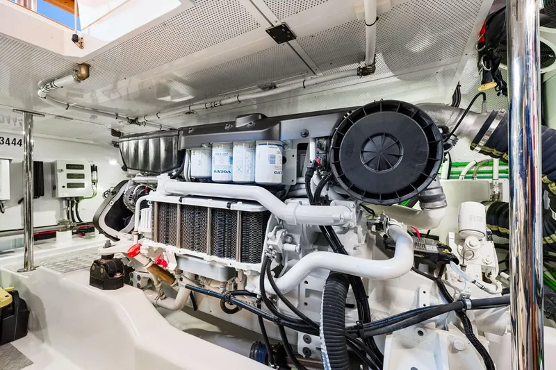 Island Girl III Yacht Photos Pics Engine room of 2024 Vicem 62 Classic yacht, showcasing detailed mechanical components.