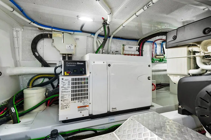 Island Girl III Yacht Photos Pics Engine room of 2024 Vicem 62 Classic yacht with Cummins Onan generator.