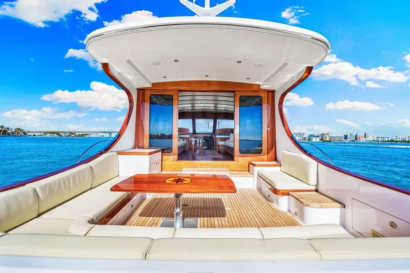 Island Girl III Yacht Photos Pics 2024 Vicem 62 Classic yacht with luxurious seating and ocean view.