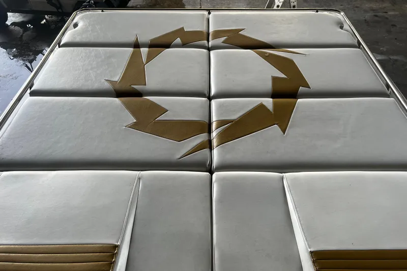  Yacht Photos Pics 2009 Fountain 42 Executioner boat upholstery with gold arrow design.