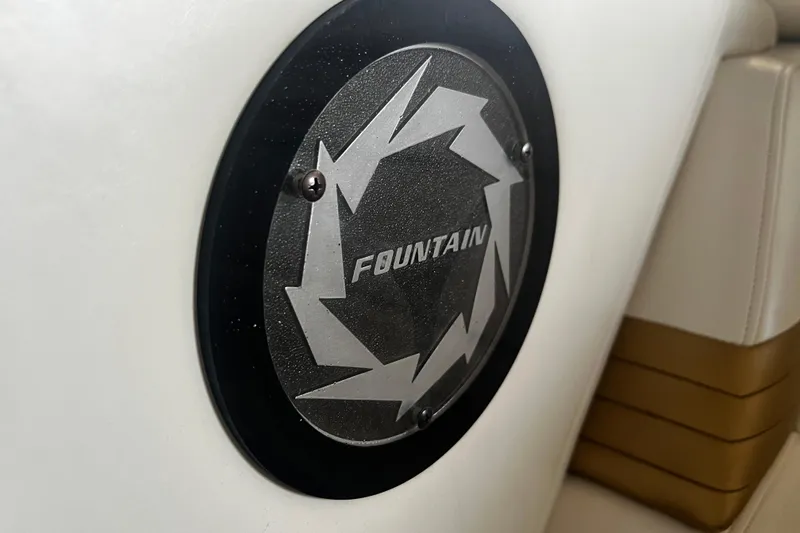  Yacht Photos Pics 2009 Fountain 42 Executioner logo on white and tan boat interior.