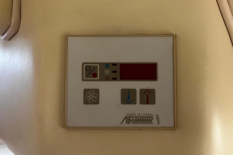  Yacht Photos Pics Control panel of a 2009 Fountain 42 Executioner boat, featuring Marine Air Systems.