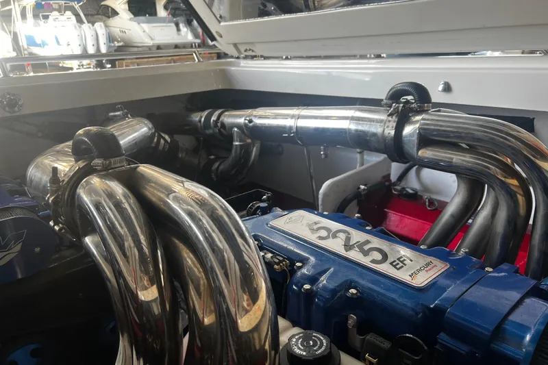  Yacht Photos Pics Engine of 2009 Fountain 42 Executioner boat with polished exhaust pipes and Mercury 525 EFI.