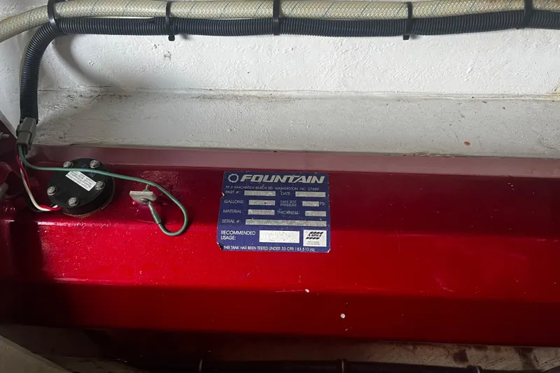  Yacht Photos Pics 2009 Fountain 42 Executioner label on red surface, showing specifications and wiring.