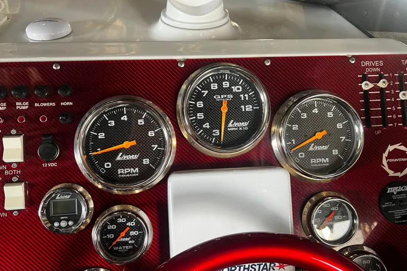  Yacht Photos Pics Dashboard of a 2009 Fountain 42 Executioner boat with Livorsi gauges and controls.