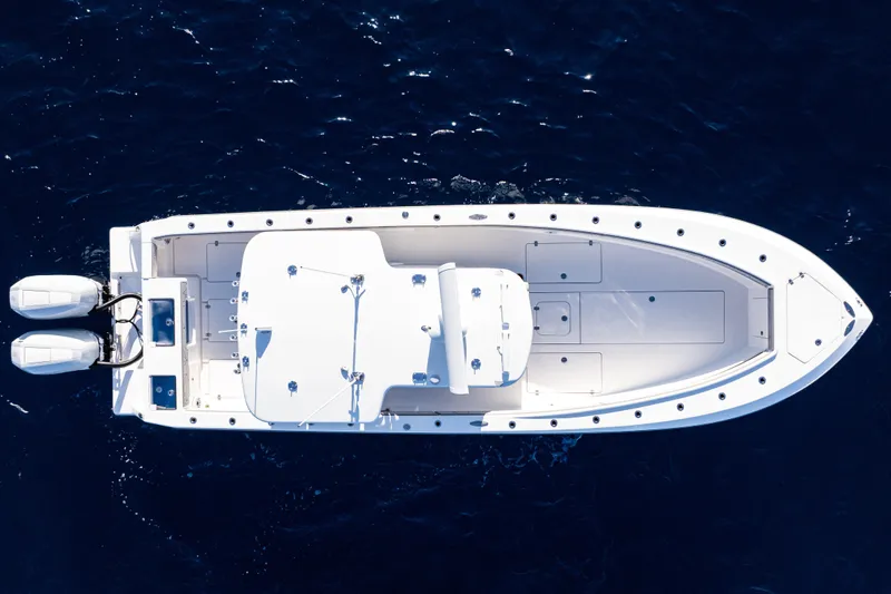  Yacht Photos Pics Aerial view of 2026 SeaVee 320B boat on deep blue ocean water.