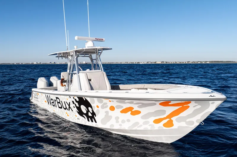  Yacht Photos Pics 2026 SeaVee 320B boat on open water, featuring custom graphics and sleek design.