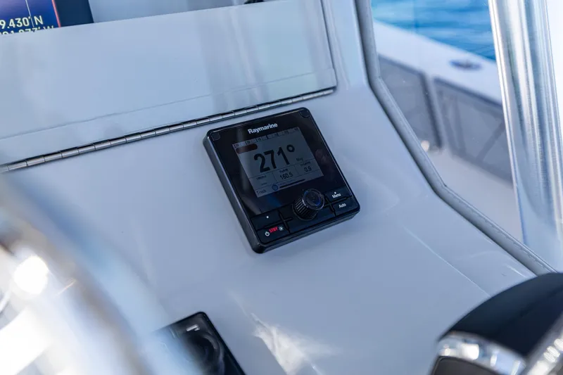  Yacht Photos Pics Raymarine navigation display on 2026 SeaVee 320B boat dashboard.