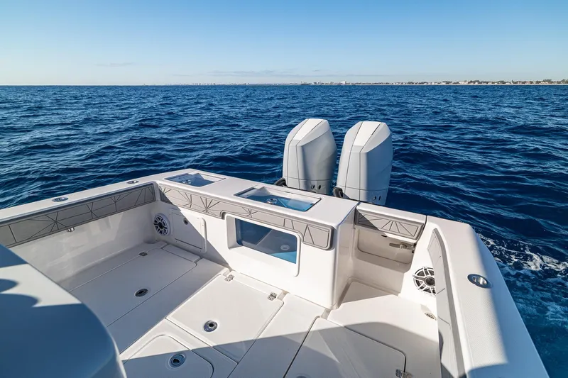  Yacht Photos Pics 2026 SeaVee 320B boat with dual engines on open ocean.