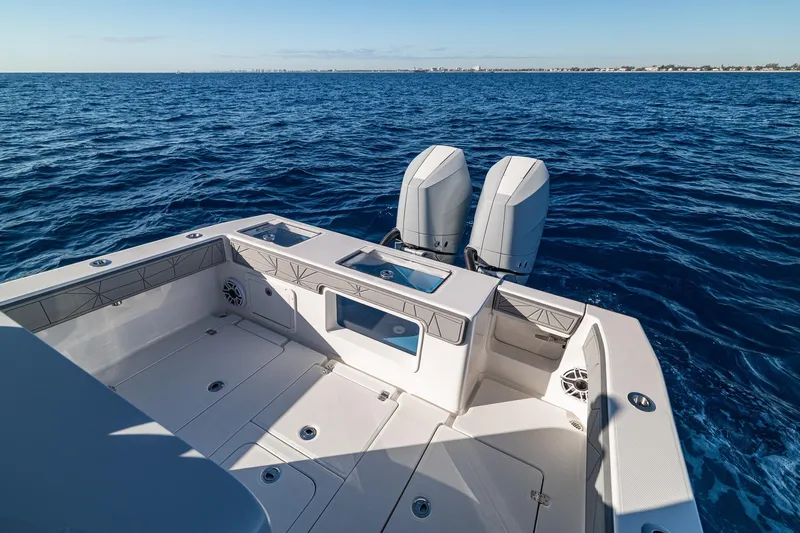  Yacht Photos Pics 2026 SeaVee 320B boat with dual engines on open ocean.