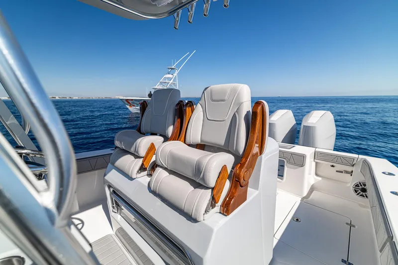  Yacht Photos Pics 2026 SeaVee 320B boat interior with luxurious seating and ocean view.