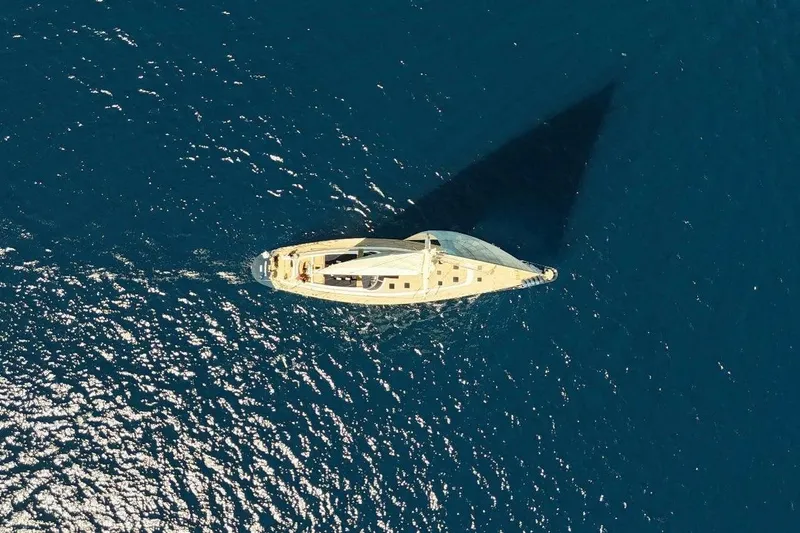 Persistence Yacht Photos Pics Aerial view of 1989 Sensation yacht sailing on deep blue ocean waters.