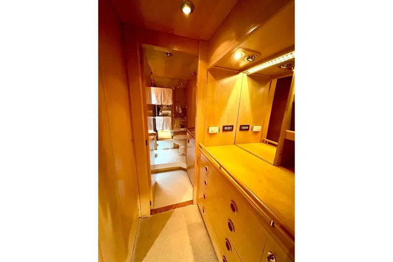Persistence Yacht Photos Pics Luxurious 1989 Sensation yacht interior with wooden cabinetry and ambient lighting.