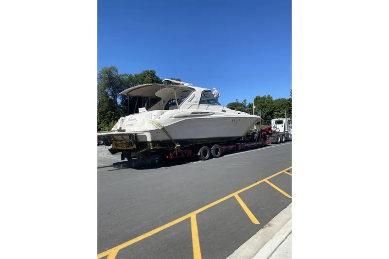  Yacht Photos Pics 1997 Sea Ray 450 Sundancer yacht on trailer, ready for transport.