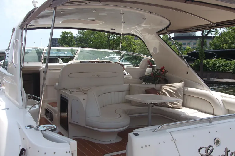  Yacht Photos Pics 1997 Sea Ray 450 Sundancer yacht interior with plush seating and elegant design.