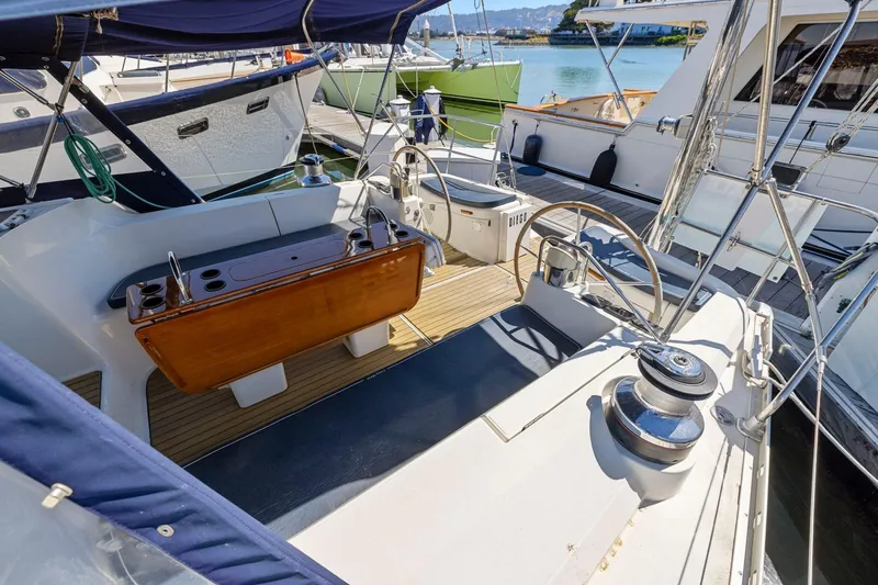 Crazy Horse Yacht Photos Pics Cockpit of 2001 Jeanneau Sun Odyssey 52.2 sailboat docked at marina.