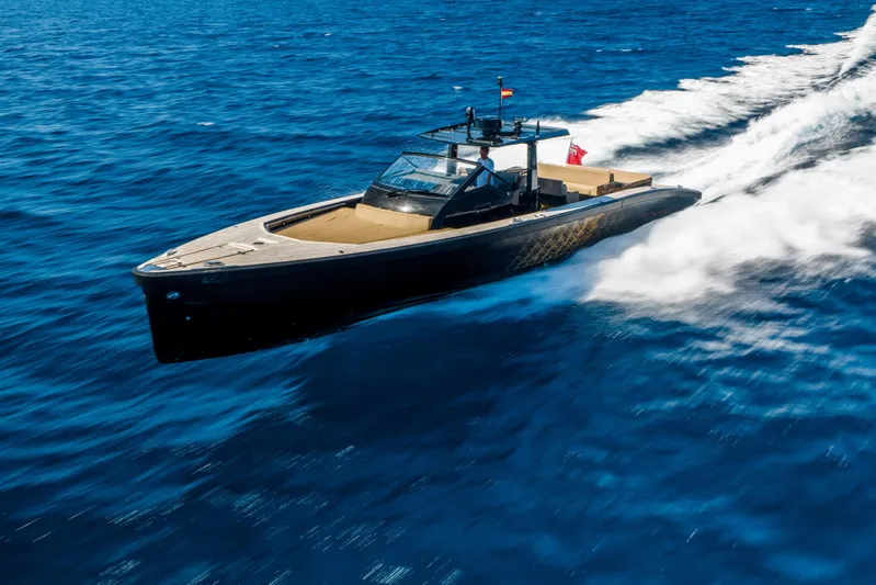 Dragon Yacht Photos Pics 2017 Windy SR52 Blackbird yacht cruising on open blue sea.