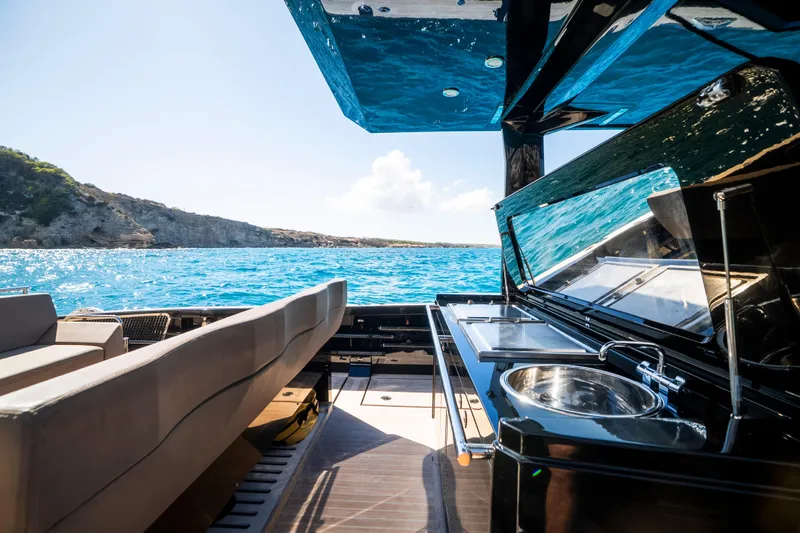 Dragon Yacht Photos Pics Luxurious 2017 Windy SR52 Blackbird yacht with sleek interior and stunning ocean view.