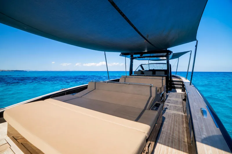 Dragon Yacht Photos Pics Luxurious 2017 Windy SR52 Blackbird yacht on clear blue ocean waters.