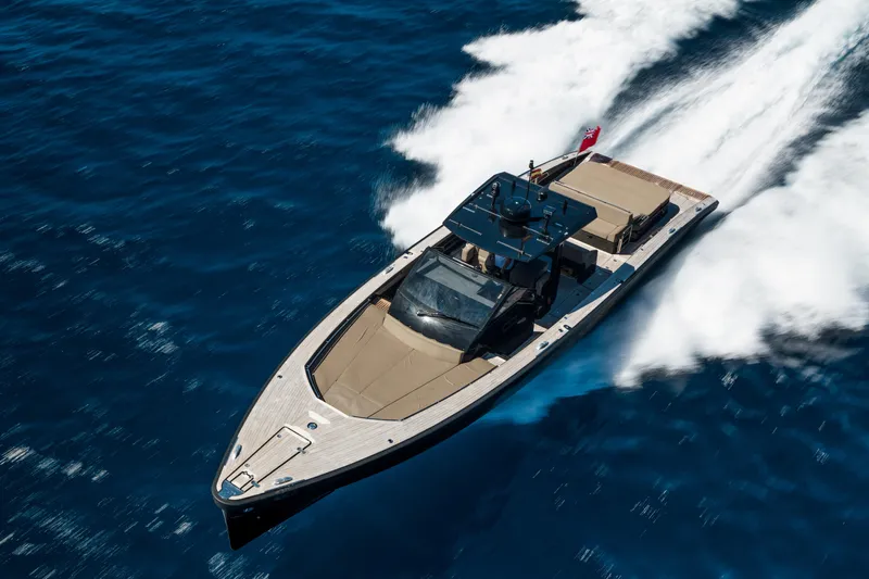 Dragon Yacht Photos Pics 2017 Windy SR52 Blackbird yacht speeding on open blue sea.