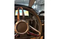 Steering wheel of 2022 Nimbus 405 Coupé in a modern cockpit setting.
