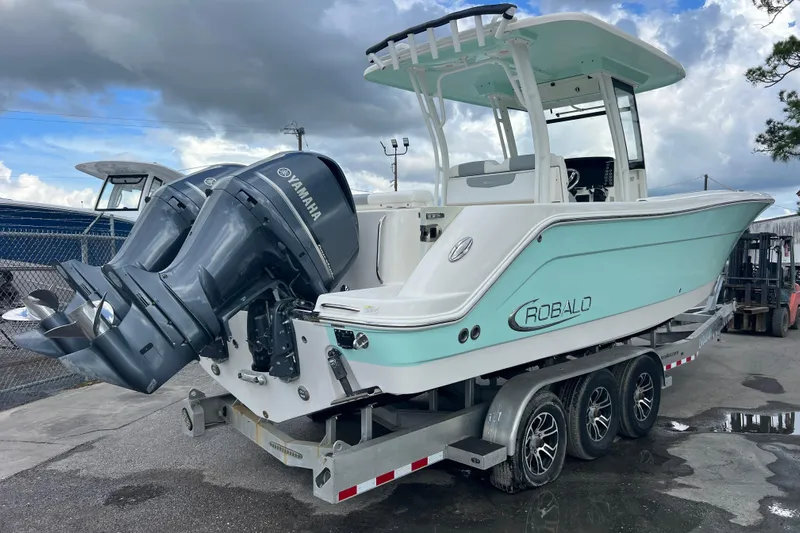  Yacht Photos Pics 2020 Robalo R302 Center Console boat with Yamaha engines on a trailer.